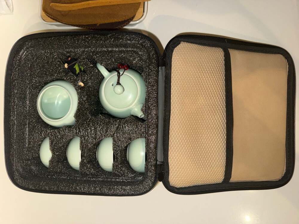 Portable Celadon Ceramic Travel Tea Set with Teapot, 4 Cups, and Bamboo Tray - Picture 2 of 5